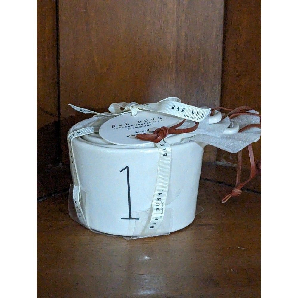 Rae Dunn white measuring cups with handles